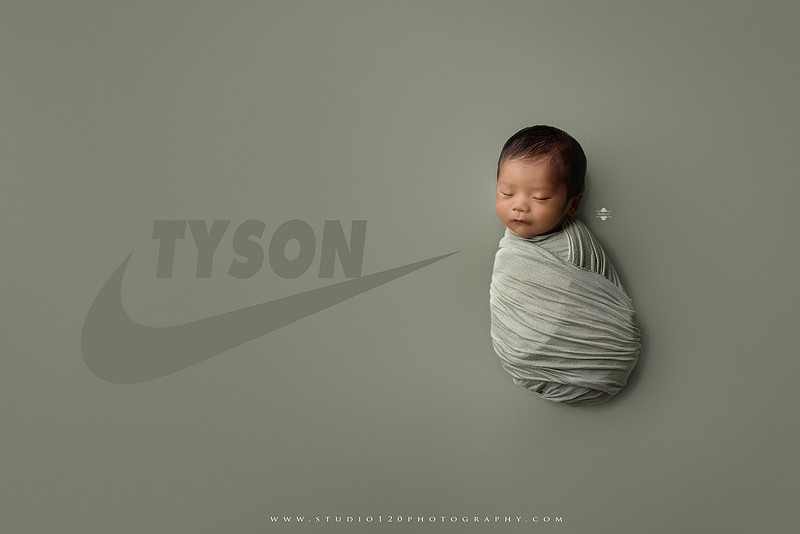“basketball themed newborn photo with baby holding mini basketball and Nike sneakers backdrop”
“sports newborn photography basketball style with sneaker stack and baby portrait”
“adorable infant with basketball and stacked shoes Nike brand inspired sports session”