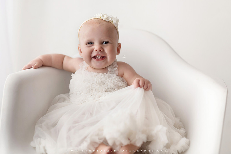SOTP1959“classic first birthday portrait of baby in white dress on neutral studio backdrop”
“timeless baby portrait in white dress with soft light and minimal styling”
“elegant first birthday photography with baby seated on white chair and floral accents”
“luxury milestone portrait of baby in white dress with airy studio lighting”
“soft and neutral first birthday portrait session highlighting baby’s expression”
“studio milestone portrait with baby in white outfit and clean minimalist setting”
“fine art baby portrait in white dress with natural light and simple backdrop”
“classic first birthday photography focused on baby in white for timeless keepsakes”