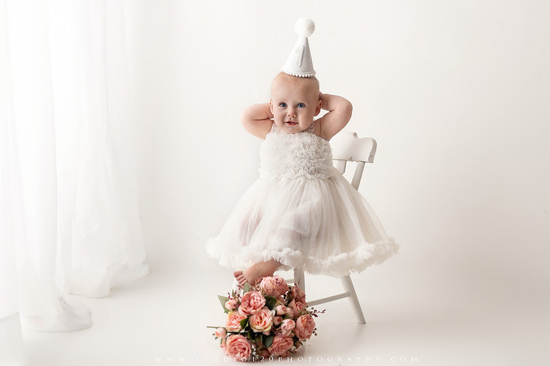 SOTP1959“classic first birthday portrait of baby in white dress on neutral studio backdrop”
“timeless baby portrait in white dress with soft light and minimal styling”
“elegant first birthday photography with baby seated on white chair and floral accents”
“luxury milestone portrait of baby in white dress with airy studio lighting”
“soft and neutral first birthday portrait session highlighting baby’s expression”
“studio milestone portrait with baby in white outfit and clean minimalist setting”
“fine art baby portrait in white dress with natural light and simple backdrop”
“classic first birthday photography focused on baby in white for timeless keepsakes”