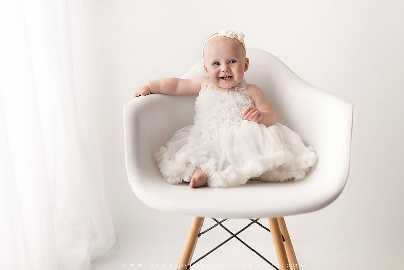 SOTP1959“classic first birthday portrait of baby in white dress on neutral studio backdrop”
“timeless baby portrait in white dress with soft light and minimal styling”
“elegant first birthday photography with baby seated on white chair and floral accents”
“luxury milestone portrait of baby in white dress with airy studio lighting”
“soft and neutral first birthday portrait session highlighting baby’s expression”
“studio milestone portrait with baby in white outfit and clean minimalist setting”
“fine art baby portrait in white dress with natural light and simple backdrop”
“classic first birthday photography focused on baby in white for timeless keepsakes”