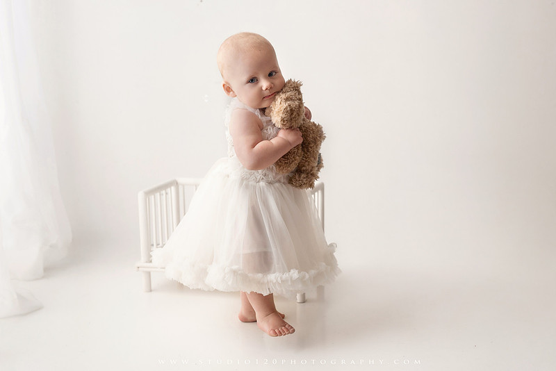 SOTP1959“classic first birthday portrait of baby in white dress on neutral studio backdrop”
“timeless baby portrait in white dress with soft light and minimal styling”
“elegant first birthday photography with baby seated on white chair and floral accents”
“luxury milestone portrait of baby in white dress with airy studio lighting”
“soft and neutral first birthday portrait session highlighting baby’s expression”
“studio milestone portrait with baby in white outfit and clean minimalist setting”
“fine art baby portrait in white dress with natural light and simple backdrop”
“classic first birthday photography focused on baby in white for timeless keepsakes”