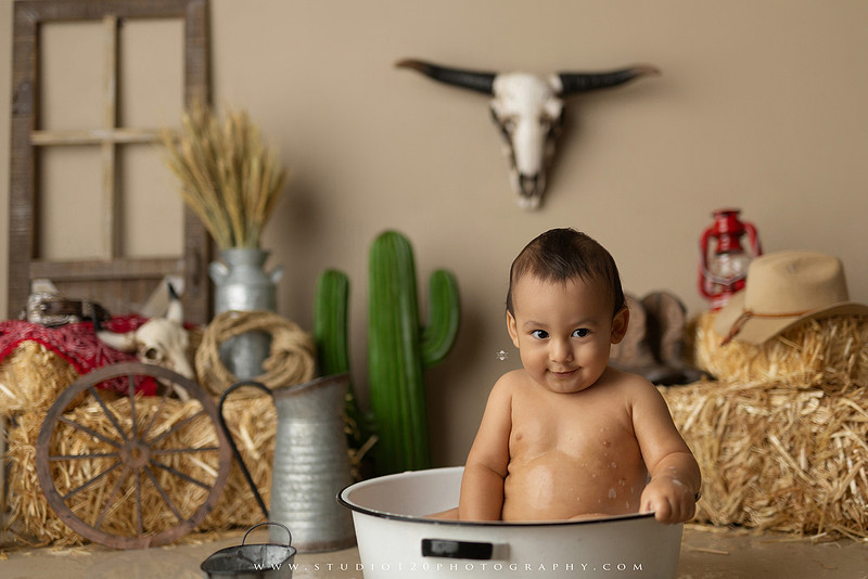 First birthday cake smash and western splash milestone session at Studio 120 Photography in Ramona California serving Poway, Santee, Lakeside, and San Diego families