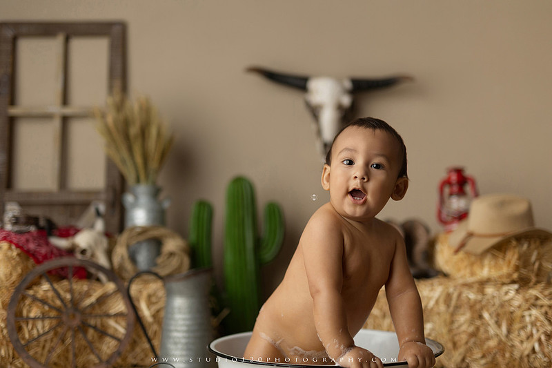 First birthday cake smash and western splash milestone session at Studio 120 Photography in Ramona California serving Poway, Santee, Lakeside, and San Diego families