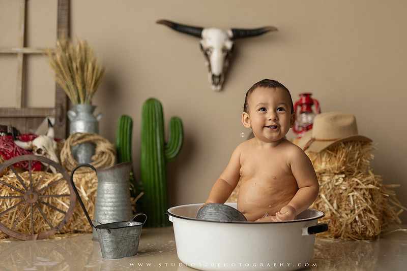 First birthday cake smash and western splash milestone session at Studio 120 Photography in Ramona California serving Poway, Santee, Lakeside, and San Diego families