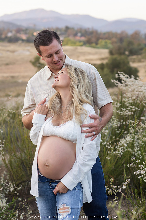 Outdoor maternity photography session in Ramona, CA featuring an expectant mother, father, and young children during golden hour with natural family portraits, pregnancy photos, and scenic Southern California landscapes by Studio 120 Photography.