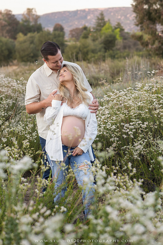 Outdoor maternity photography session in Ramona, CA featuring an expectant mother, father, and young children during golden hour with natural family portraits, pregnancy photos, and scenic Southern California landscapes by Studio 120 Photography.