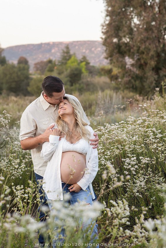 Outdoor maternity photography session in Ramona, CA featuring an expectant mother, father, and young children during golden hour with natural family portraits, pregnancy photos, and scenic Southern California landscapes by Studio 120 Photography.