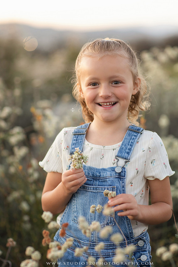 Outdoor maternity photography session in Ramona, CA featuring an expectant mother, father, and young children during golden hour with natural family portraits, pregnancy photos, and scenic Southern California landscapes by Studio 120 Photography.