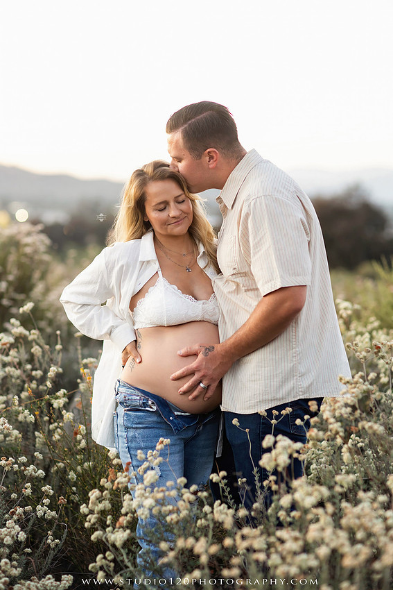 Outdoor maternity photography session in Ramona, CA featuring an expectant mother, father, and young children during golden hour with natural family portraits, pregnancy photos, and scenic Southern California landscapes by Studio 120 Photography.