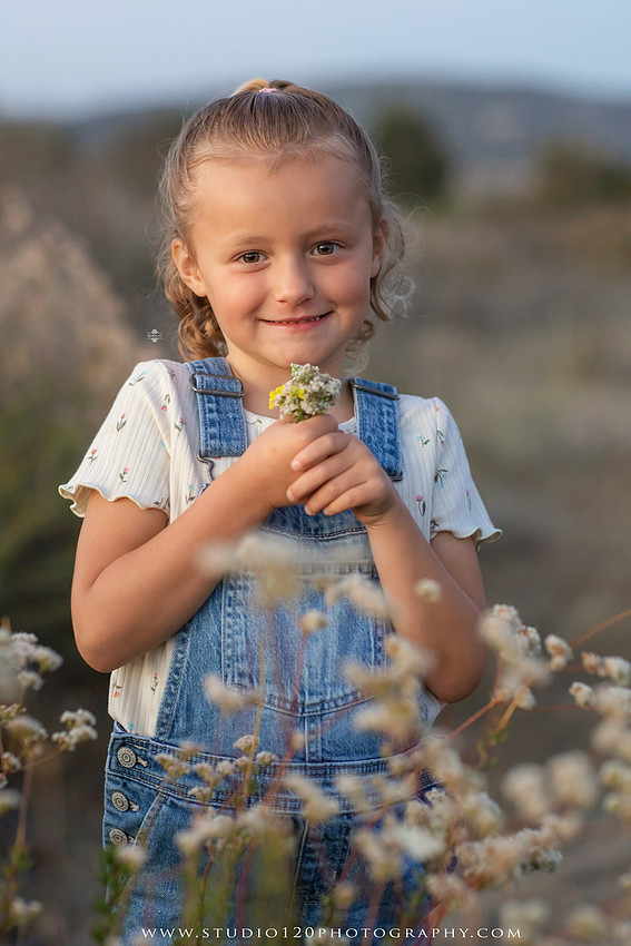 Outdoor maternity photography session in Ramona, CA featuring an expectant mother, father, and young children during golden hour with natural family portraits, pregnancy photos, and scenic Southern California landscapes by Studio 120 Photography.
