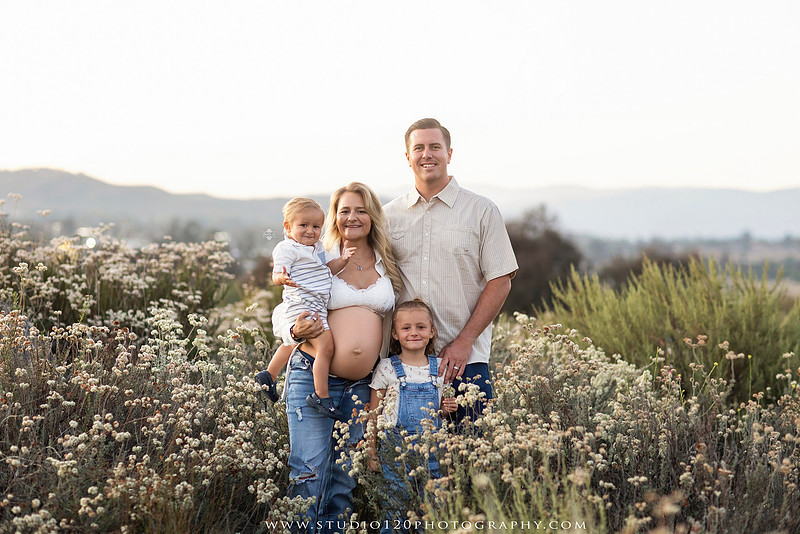 Outdoor maternity photography session in Ramona, CA featuring an expectant mother, father, and young children during golden hour with natural family portraits, pregnancy photos, and scenic Southern California landscapes by Studio 120 Photography.