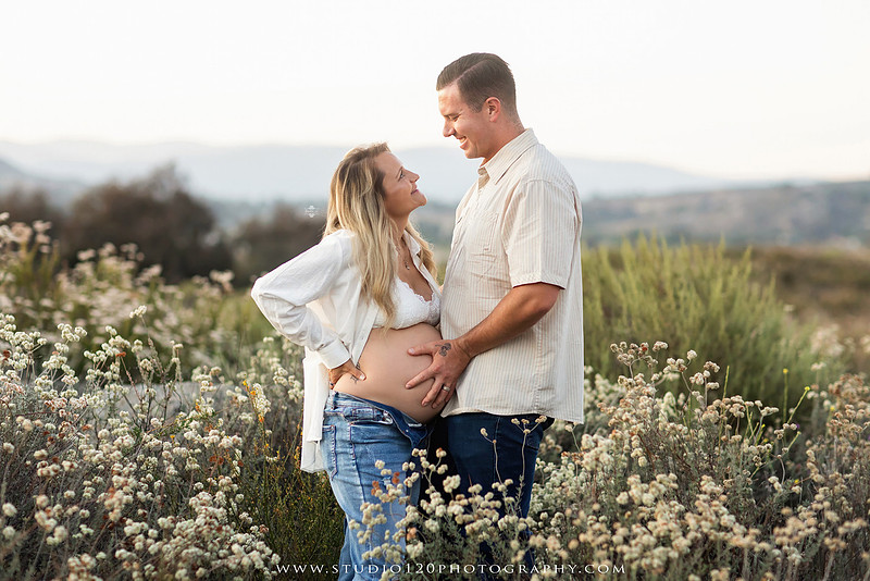 Outdoor maternity photography session in Ramona, CA featuring an expectant mother, father, and young children during golden hour with natural family portraits, pregnancy photos, and scenic Southern California landscapes by Studio 120 Photography.