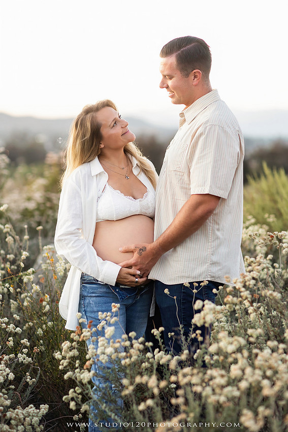 Outdoor maternity photography session in Ramona, CA featuring an expectant mother, father, and young children during golden hour with natural family portraits, pregnancy photos, and scenic Southern California landscapes by Studio 120 Photography.