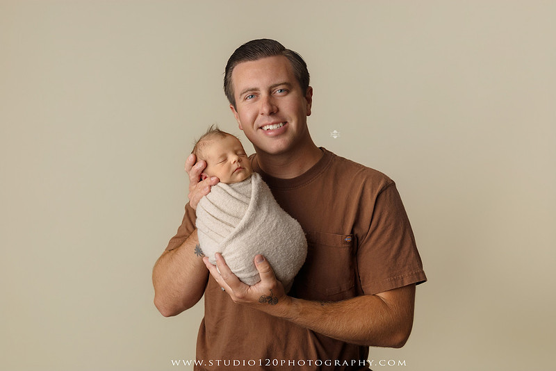 Professional newborn photography session in Ramona featuring a sleeping baby boy, sibling portraits, loving family photos, timeless neutral styling, wrapped newborn poses, and classic studio portraits by Studio 120 Photography.