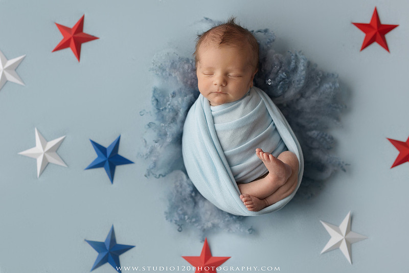 Professional newborn photography session in Ramona featuring a sleeping baby boy, sibling portraits, loving family photos, timeless neutral styling, wrapped newborn poses, and classic studio portraits by Studio 120 Photography.