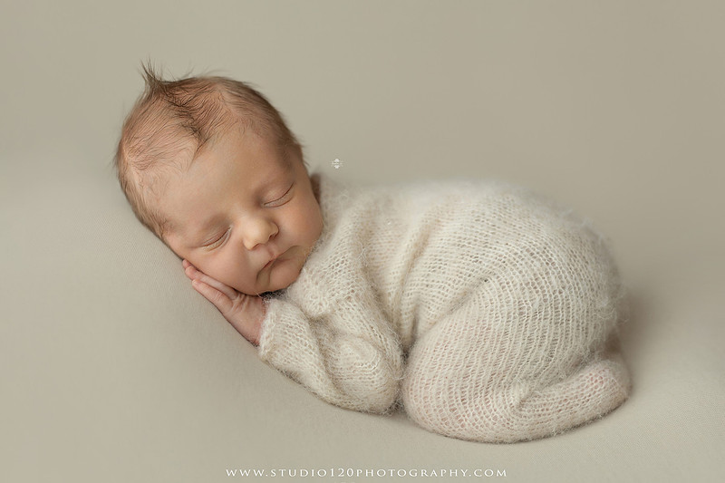 Professional newborn photography session in Ramona featuring a sleeping baby boy, sibling portraits, loving family photos, timeless neutral styling, wrapped newborn poses, and classic studio portraits by Studio 120 Photography.