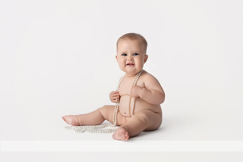 Professional milestone photography session in Ramona featuring a smiling baby girl, mother and baby portraits, classic sitter milestone photos, timeless neutral styling, and first year baby photography by Studio 120 Photography.