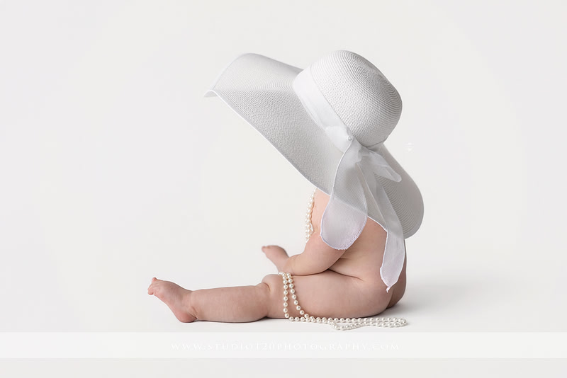 Professional milestone photography session in Ramona featuring a smiling baby girl, mother and baby portraits, classic sitter milestone photos, timeless neutral styling, and first year baby photography by Studio 120 Photography.