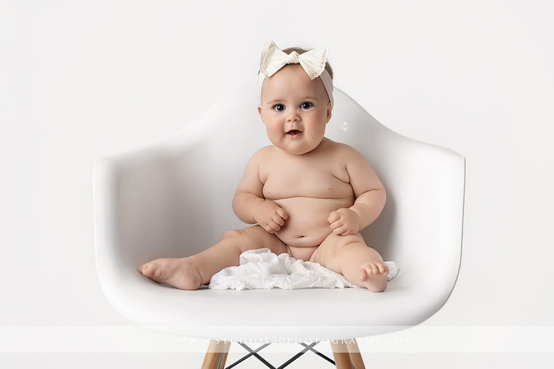 Professional milestone photography session in Ramona featuring a smiling baby girl, mother and baby portraits, classic sitter milestone photos, timeless neutral styling, and first year baby photography by Studio 120 Photography.