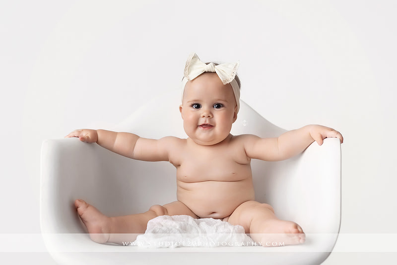 Professional milestone photography session in Ramona featuring a smiling baby girl, mother and baby portraits, classic sitter milestone photos, timeless neutral styling, and first year baby photography by Studio 120 Photography.