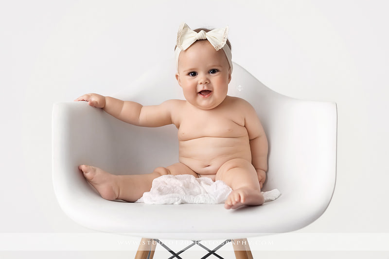 Professional milestone photography session in Ramona featuring a smiling baby girl, mother and baby portraits, classic sitter milestone photos, timeless neutral styling, and first year baby photography by Studio 120 Photography.