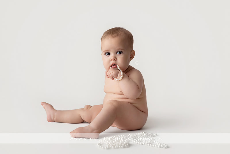 Professional milestone photography session in Ramona featuring a smiling baby girl, mother and baby portraits, classic sitter milestone photos, timeless neutral styling, and first year baby photography by Studio 120 Photography.