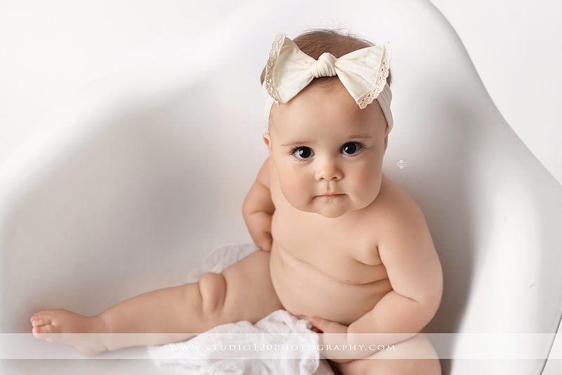 Professional milestone photography session in Ramona featuring a smiling baby girl, mother and baby portraits, classic sitter milestone photos, timeless neutral styling, and first year baby photography by Studio 120 Photography.