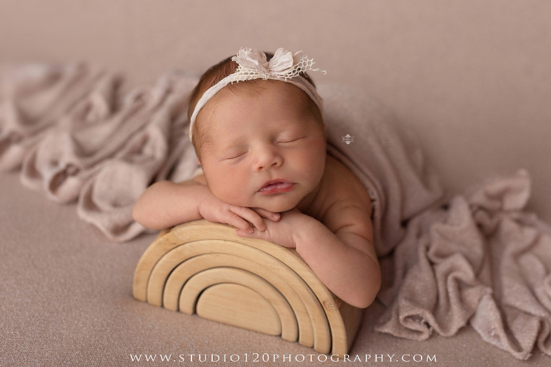 One of the most memorable images is the custom ASTRID letter artwork. This composite portrait combines creativity with personalization, creating a piece of wall art that's as unique as she is. Custom composite artwork like this has become one of my favorite ways to give families something truly unforgettable.