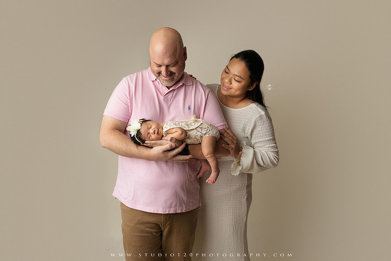Newborn photography session at Studio 120 Photography in Ramona, California, featuring a baby girl in soft pink, cream, floral and neutral setups, custom portraits with her mother’s Labubu doll collection, sibling photos with her three big brothers, family portraits with Mom and Dad, and timeless baby-only images.