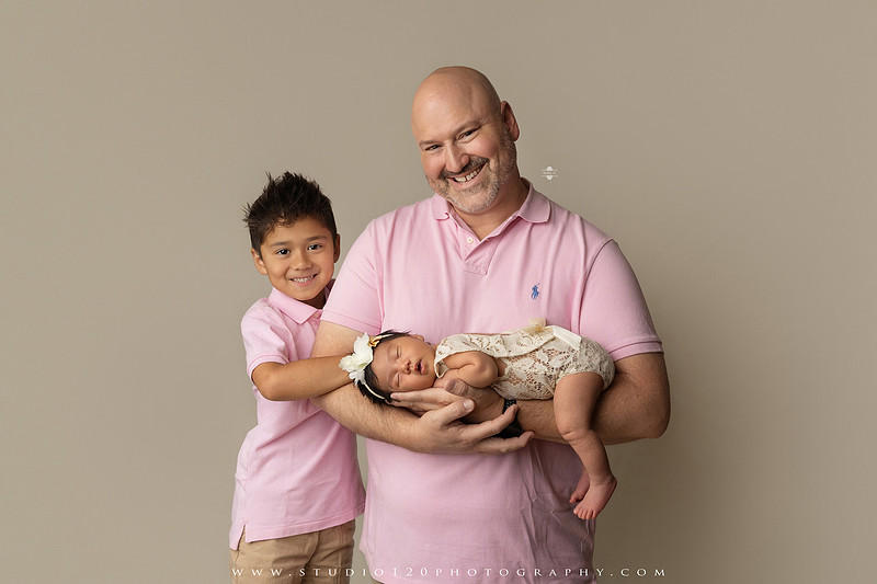 Newborn photography session at Studio 120 Photography in Ramona, California, featuring a baby girl in soft pink, cream, floral and neutral setups, custom portraits with her mother’s Labubu doll collection, sibling photos with her three big brothers, family portraits with Mom and Dad, and timeless baby-only images.