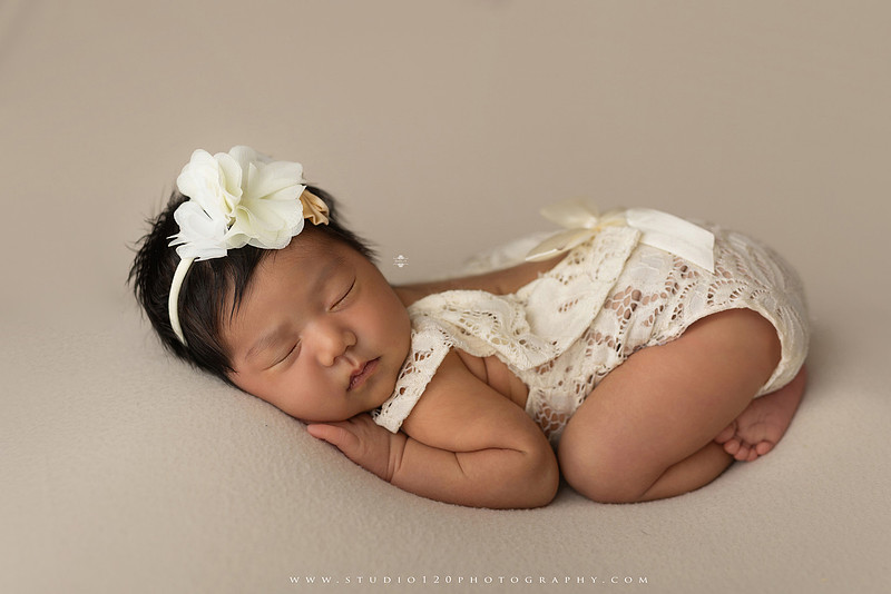 Newborn photography session at Studio 120 Photography in Ramona, California, featuring a baby girl in soft pink, cream, floral and neutral setups, custom portraits with her mother’s Labubu doll collection, sibling photos with her three big brothers, family portraits with Mom and Dad, and timeless baby-only images.