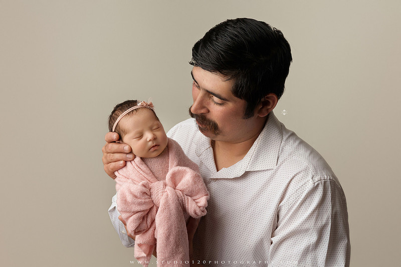 Newborn baby girl photography session featuring soft pink, lavender, blue and neutral styling, floral newborn portraits, rustic western-inspired setups, sibling photos with two big brothers, and family portraits with parents at Studio 120 Photography in Ramona, California.