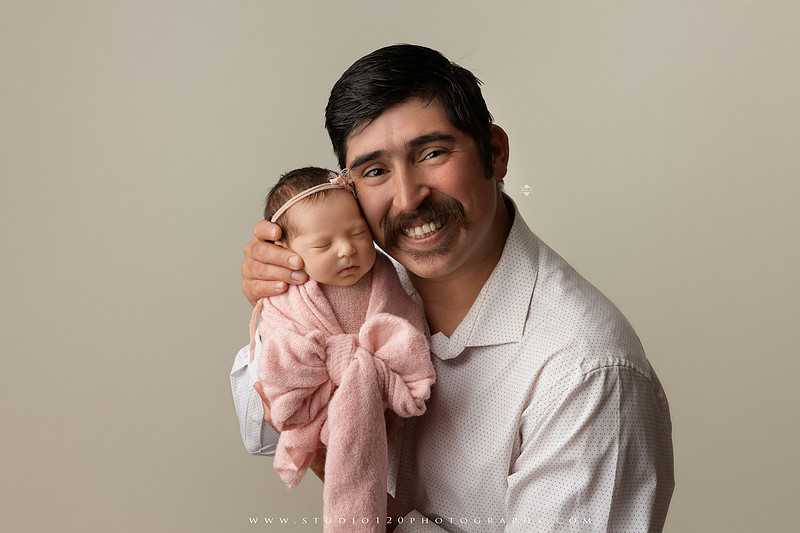 Newborn baby girl photography session featuring soft pink, lavender, blue and neutral styling, floral newborn portraits, rustic western-inspired setups, sibling photos with two big brothers, and family portraits with parents at Studio 120 Photography in Ramona, California.