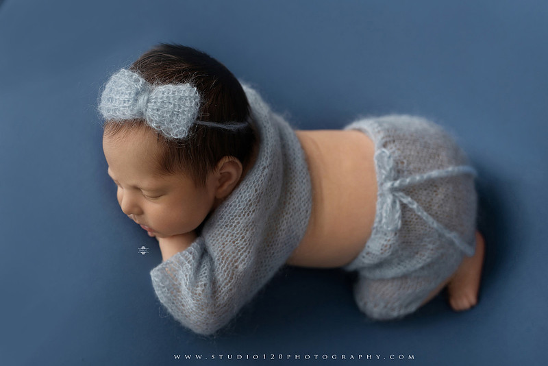 Newborn baby girl photography session featuring soft pink, lavender, blue and neutral styling, floral newborn portraits, rustic western-inspired setups, sibling photos with two big brothers, and family portraits with parents at Studio 120 Photography in Ramona, California.