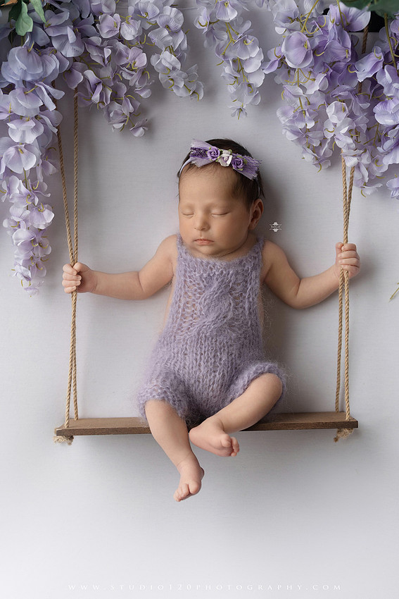 Newborn baby girl photography session featuring soft pink, lavender, blue and neutral styling, floral newborn portraits, rustic western-inspired setups, sibling photos with two big brothers, and family portraits with parents at Studio 120 Photography in Ramona, California.