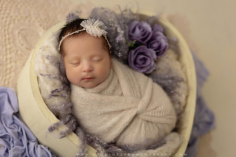 Newborn baby girl photography session featuring soft pink, lavender, blue and neutral styling, floral newborn portraits, rustic western-inspired setups, sibling photos with two big brothers, and family portraits with parents at Studio 120 Photography in Ramona, California.